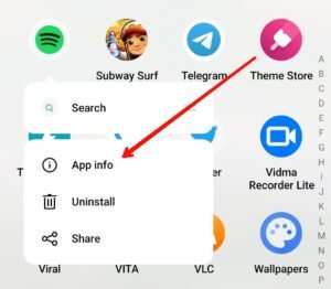 long tap on spotify and tap on app info